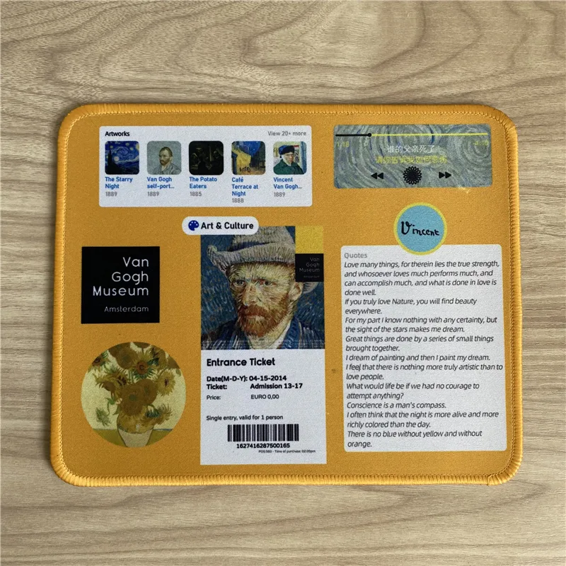 Full-print desk mat with a Van Gogh exhibition poster design: ticket layouts, museum card and quotes in fine print, photographed flat
