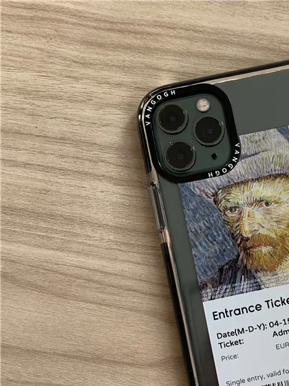 Clear phone case with lettering printed in a ring around the camera module cutout